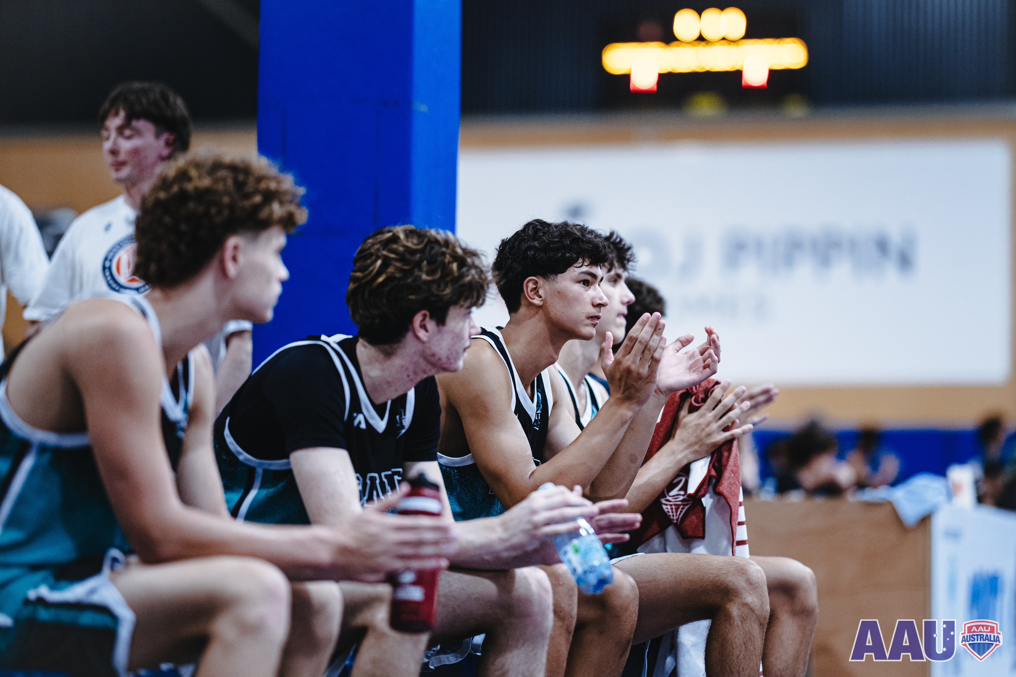 GC Ignite team on bench cheering